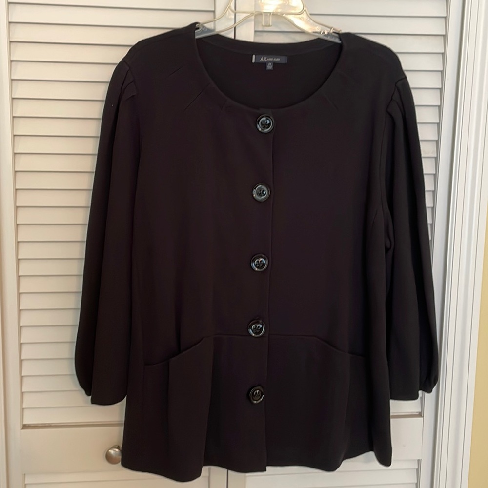 Anne Klein button down sweater with front pockets.
